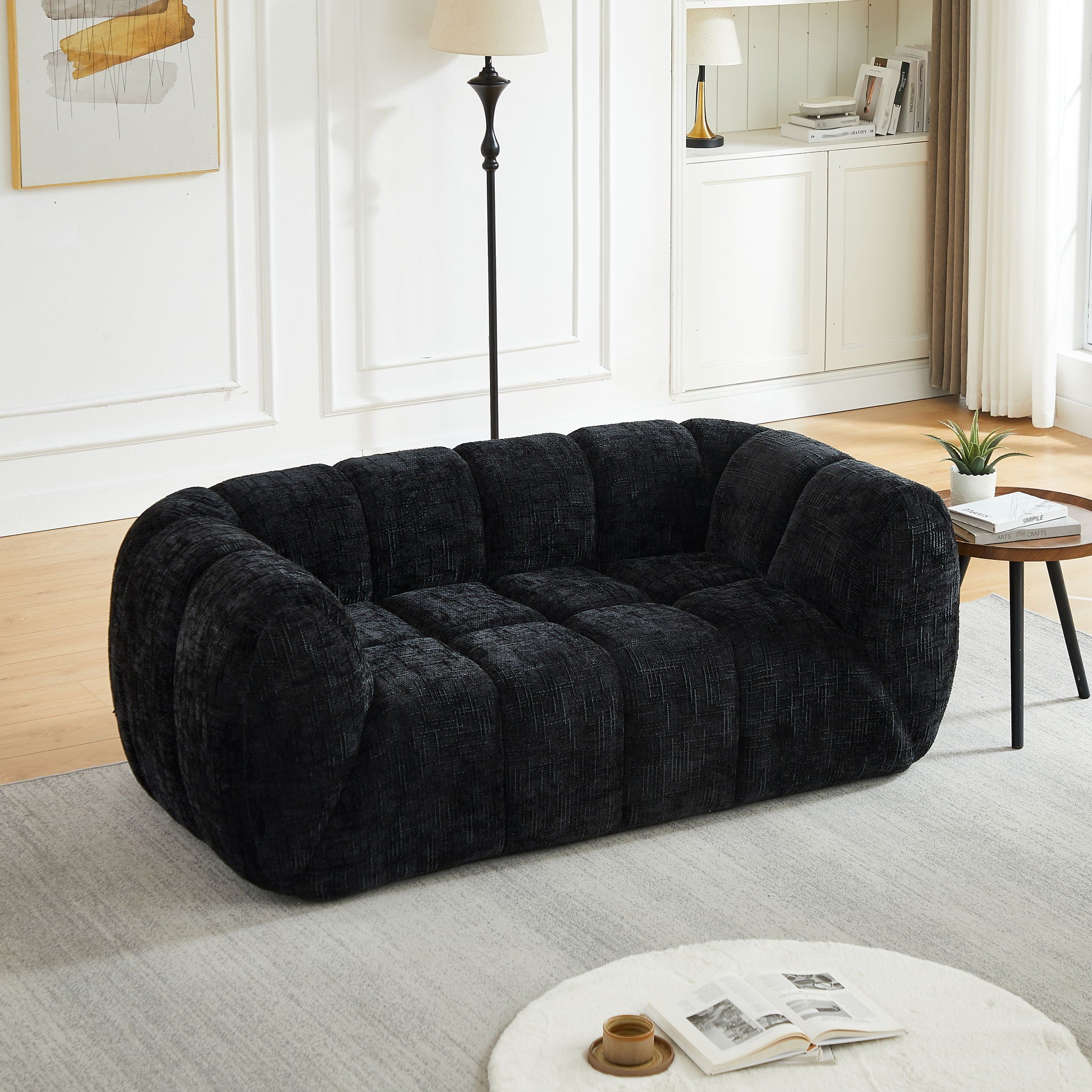Quilted Cloud Sofa With Rounded Armrests And Piano Key Backrest Design
