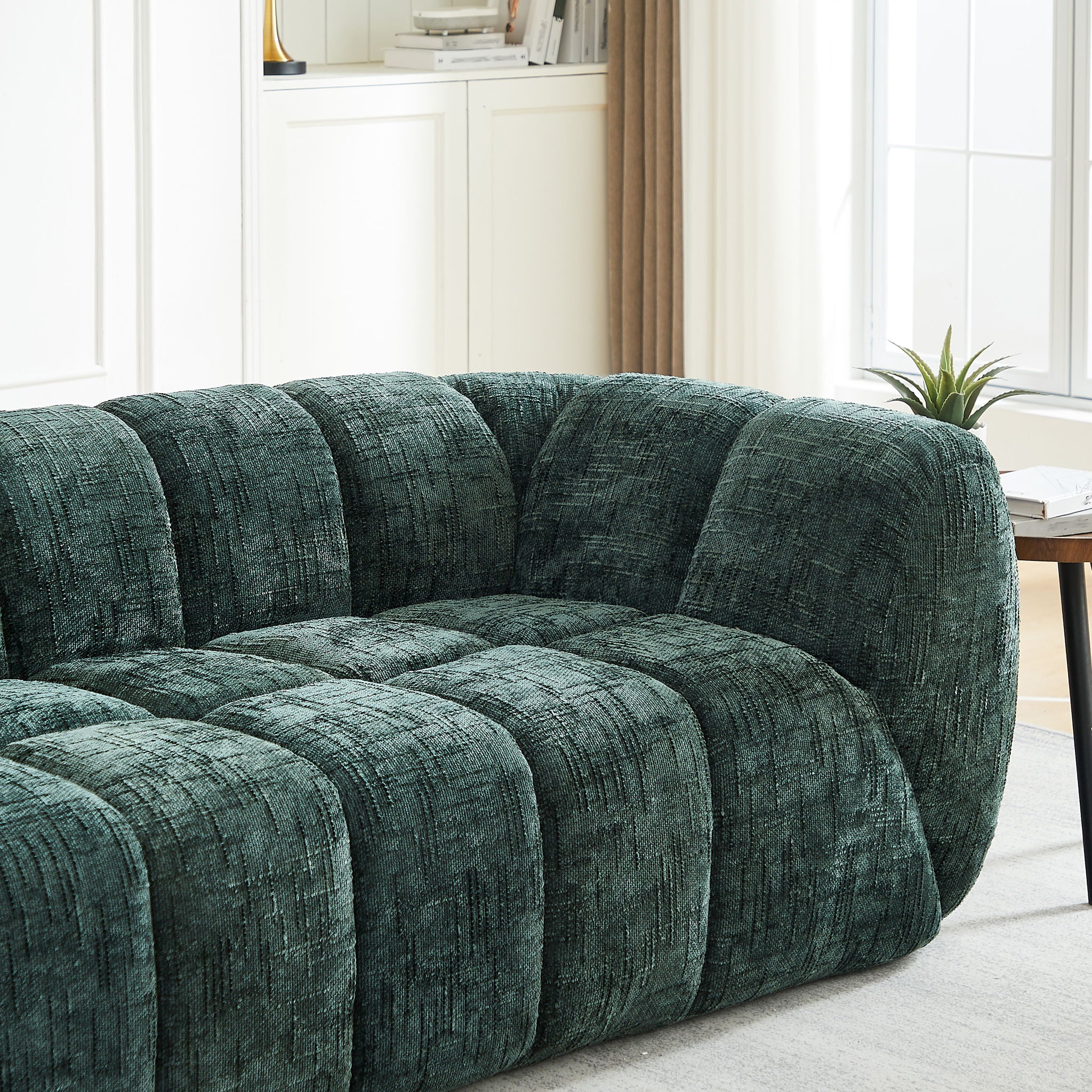 Quilted Cloud Sofa With Rounded Armrests And Piano Key Backrest Design